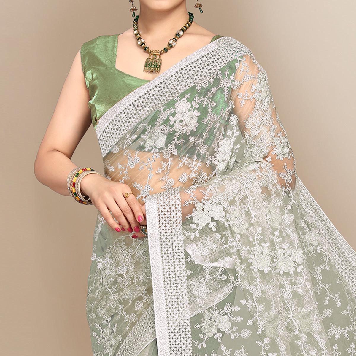 green-partywear-floral-embroidered-soft-net-saree-129763
