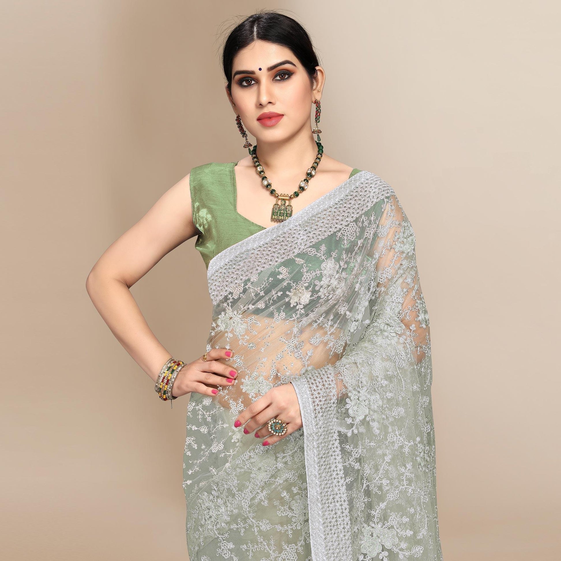 green-partywear-floral-embroidered-soft-net-saree-129763