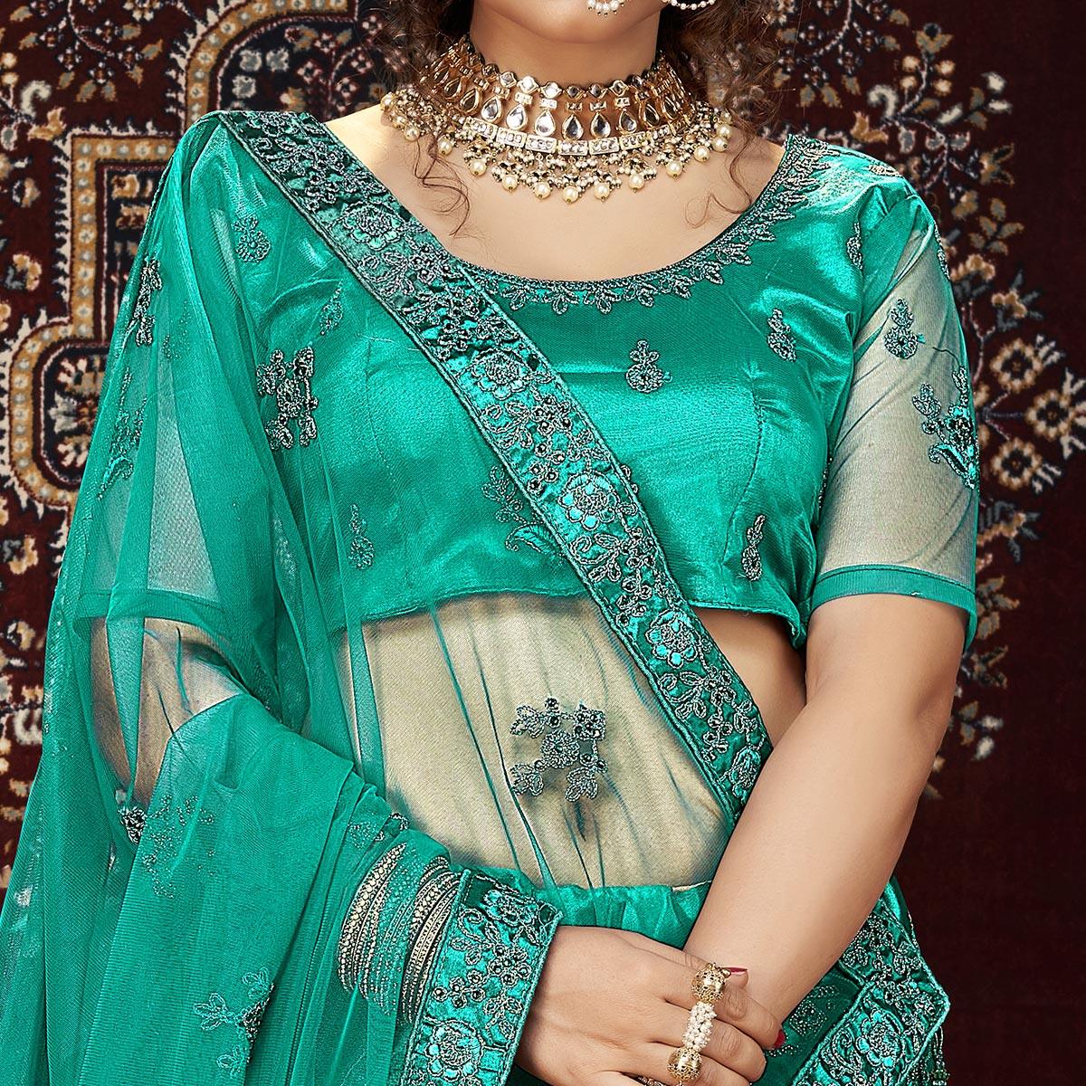 green-partywear-multi-sequence-embroidered-net-lehenga-choli-134237