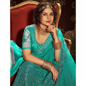 green-partywear-multi-sequence-embroidered-net-lehenga-choli-134237
