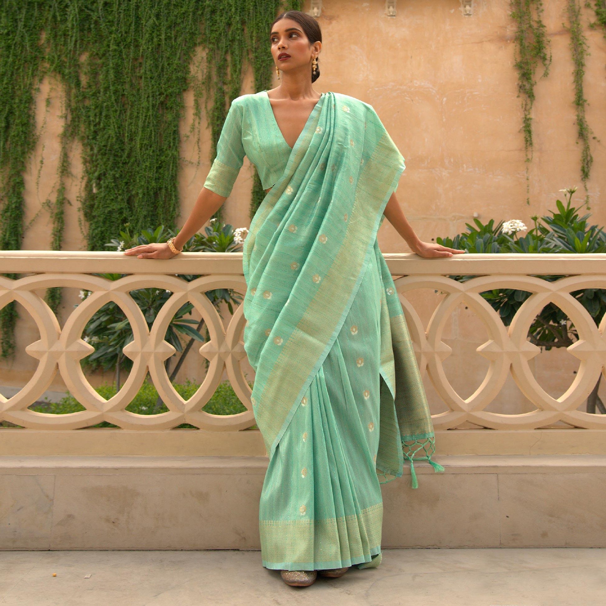 green-partywear-sequence-woven-silk-saree-134704