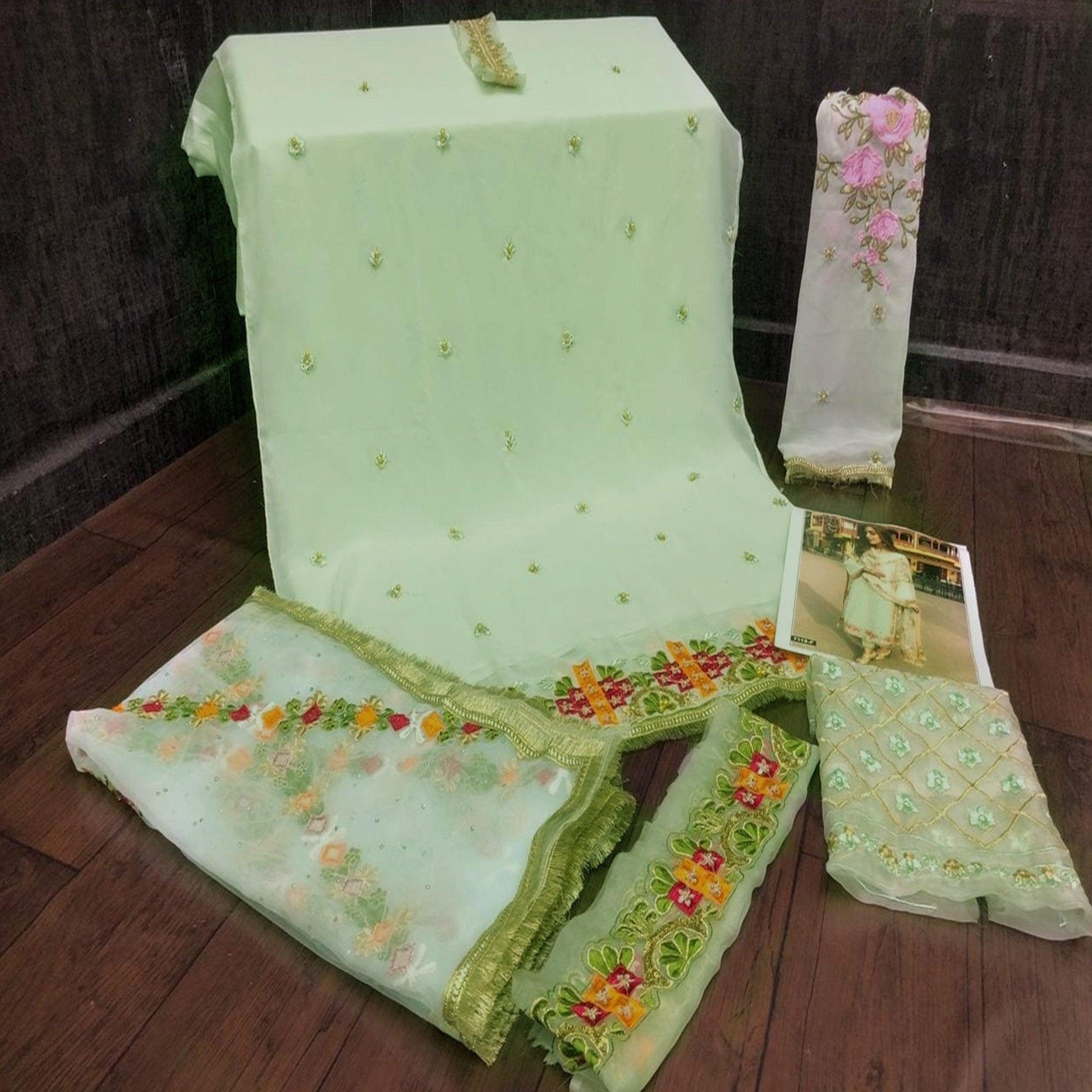 green-partywear-straight-cut-style-embroidery-and-moti-work-faux-georgette-salwar-suit-111898