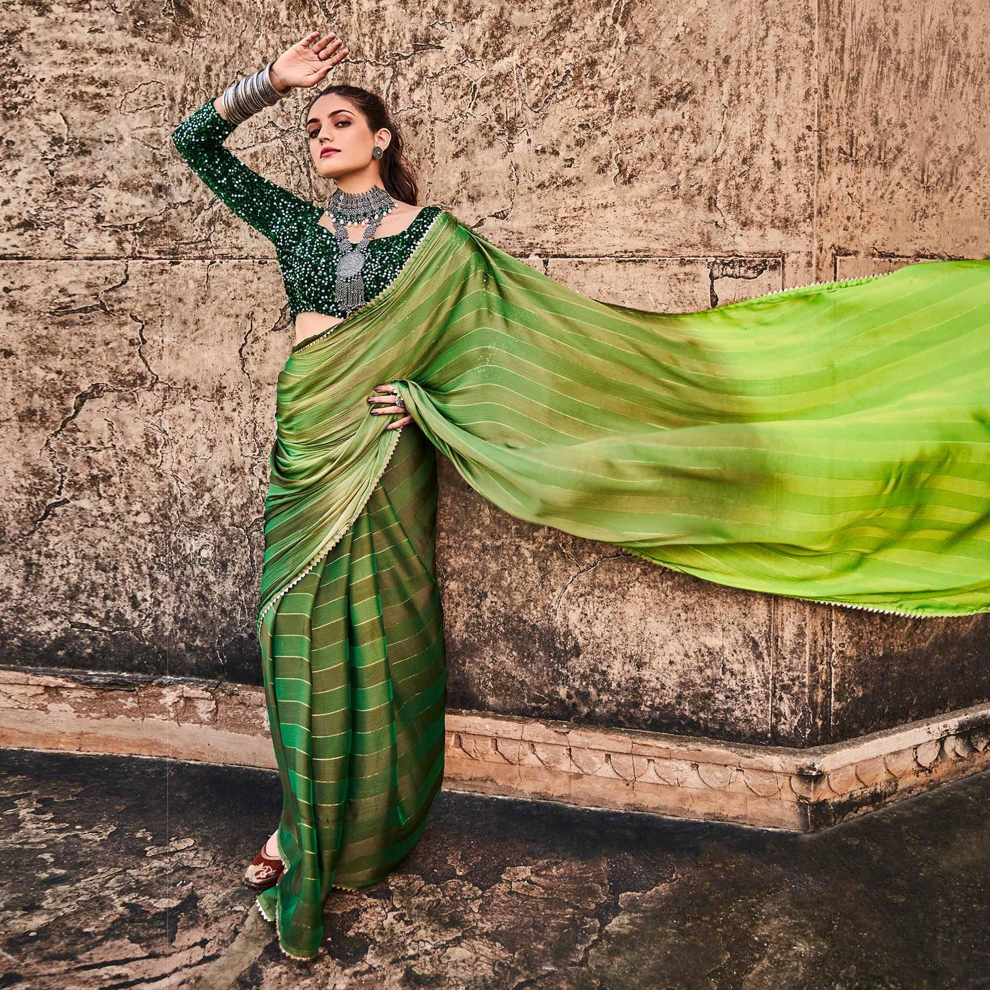 green-partywear-striped-printed-velvet-saree-with-fancy-lace-127439