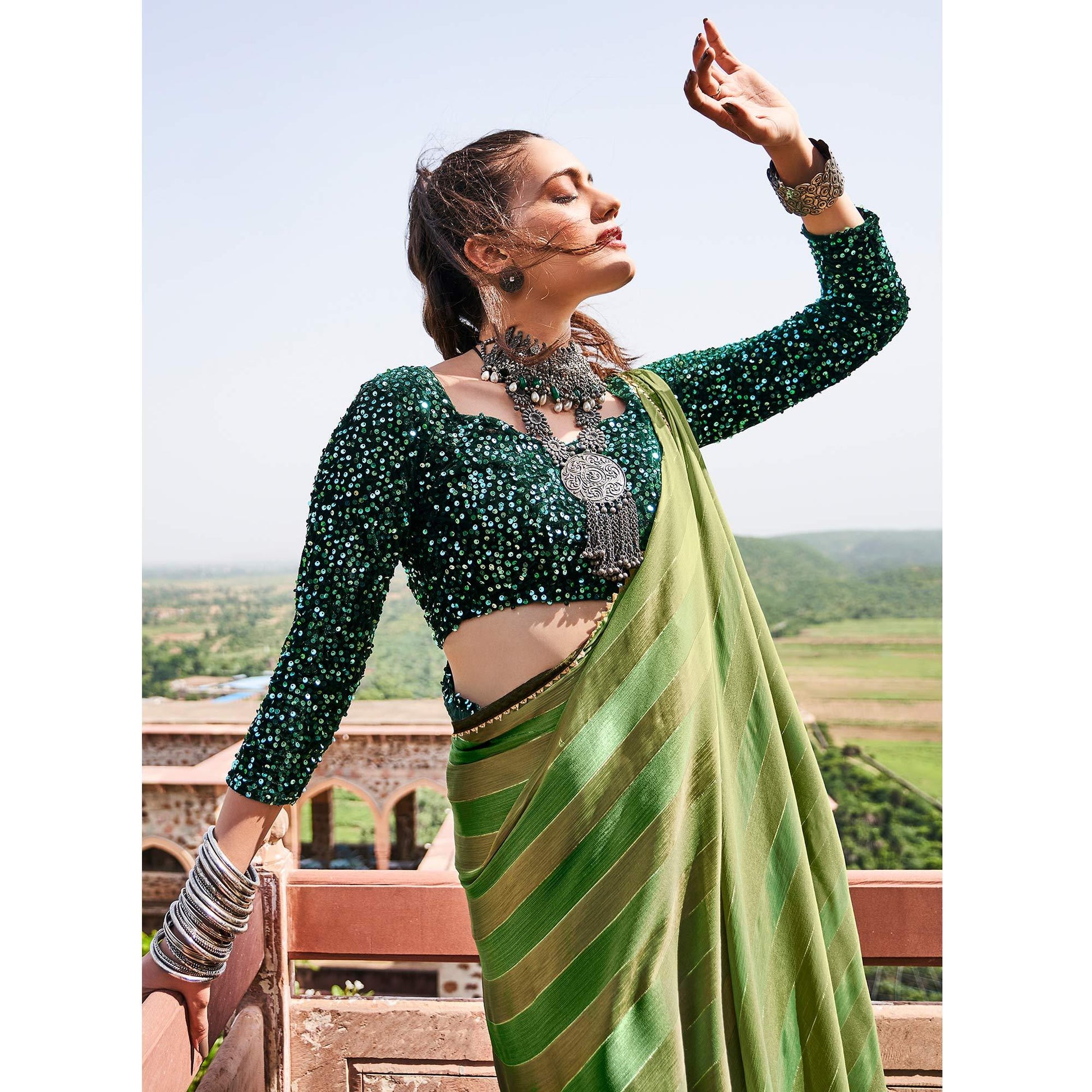 green-partywear-striped-printed-velvet-saree-with-fancy-lace-127439