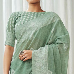 green-partywear-woven-lucknowi-linen-saree-138053