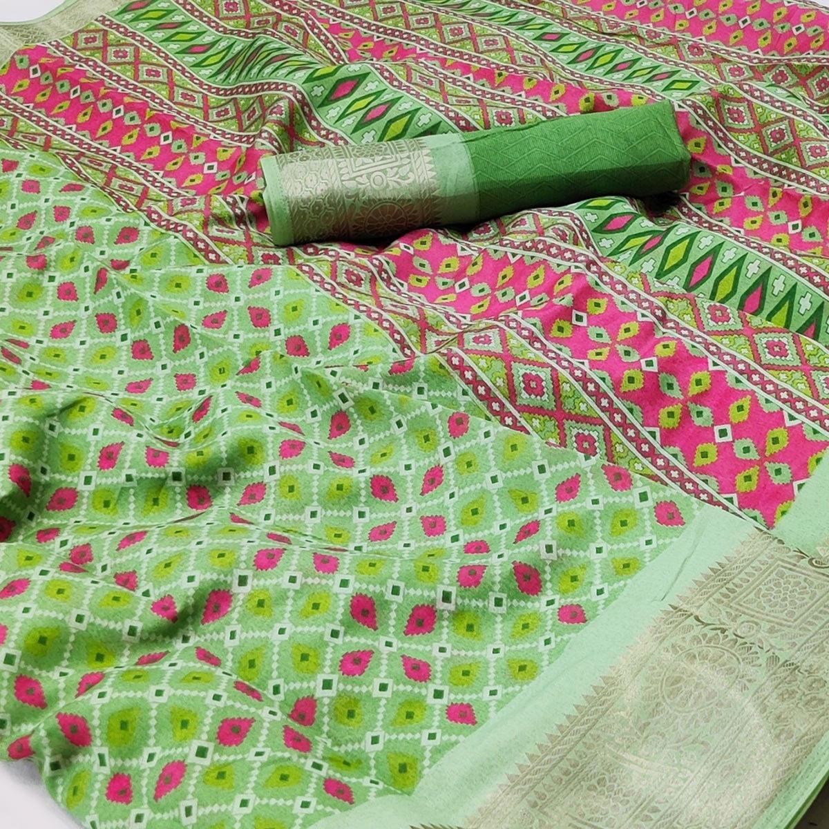 green-patola-printed-dola-silk-saree