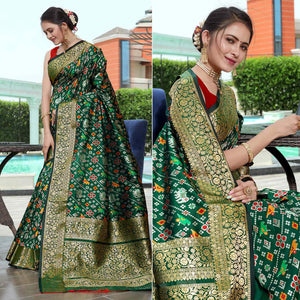 green-patola-printed-with-woven-border-banarasi-silk-saree-1