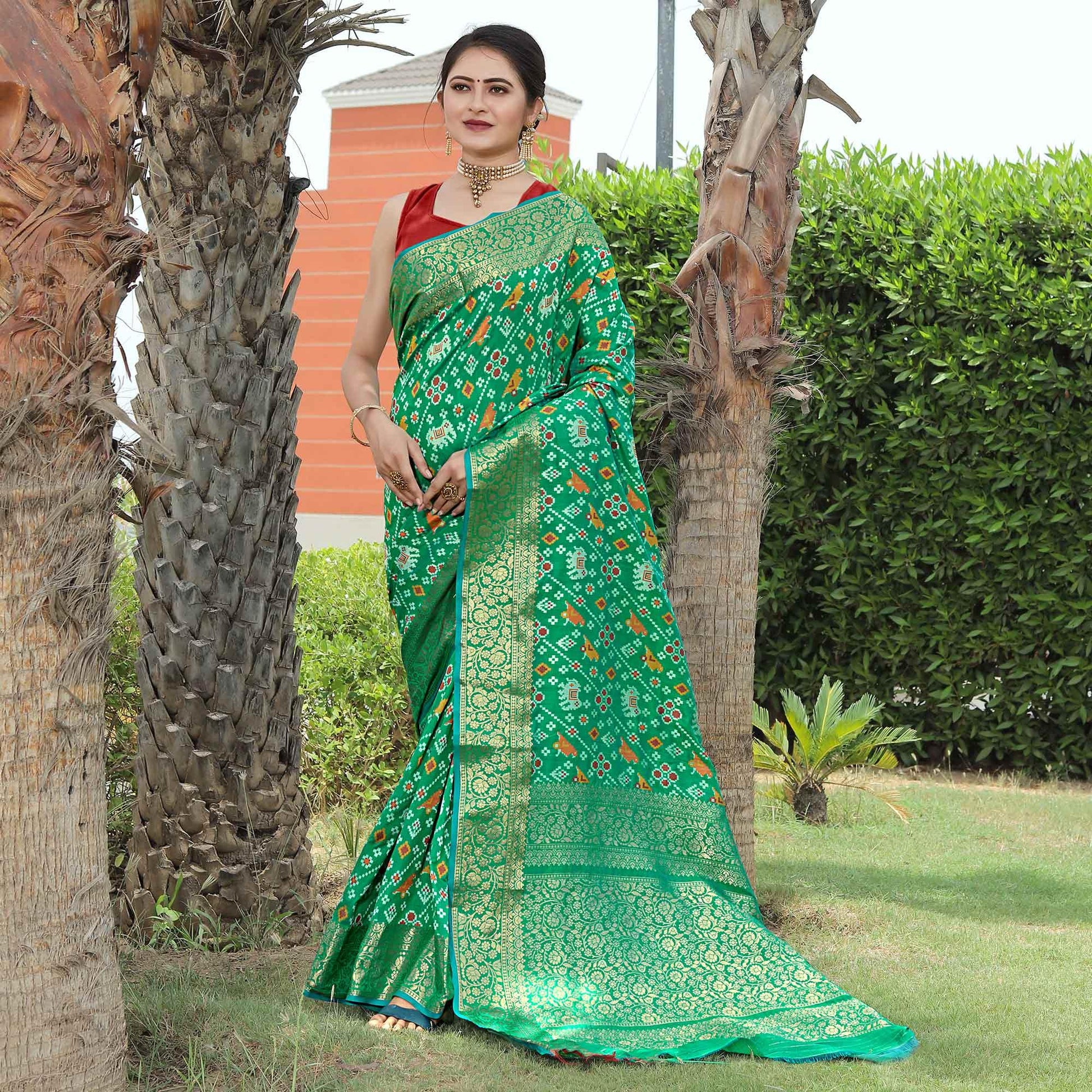 green-patola-printed-with-woven-border-banarasi-silk-saree