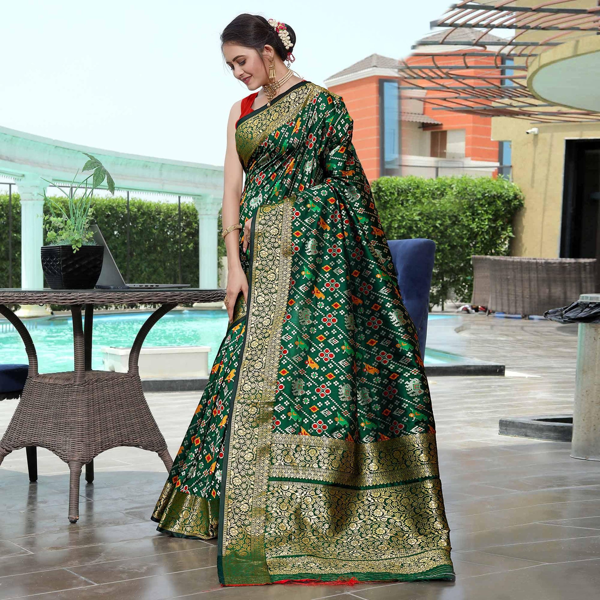 green-patola-printed-with-woven-border-banarasi-silk-saree-1
