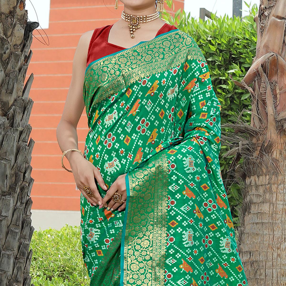 green-patola-printed-with-woven-border-banarasi-silk-saree