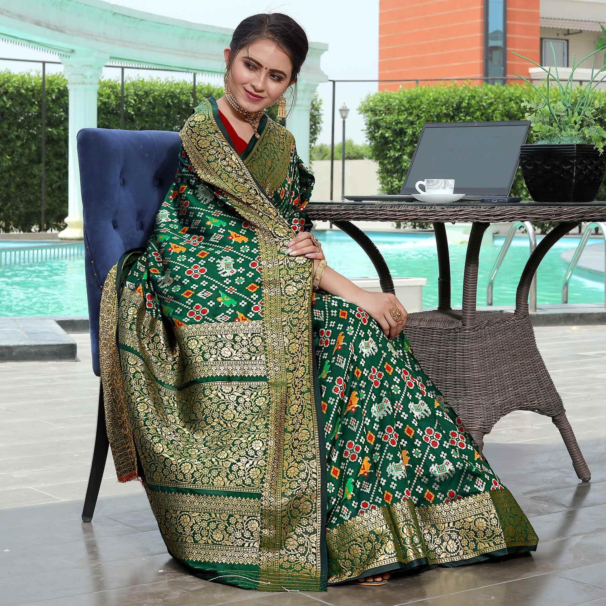 green-patola-printed-with-woven-border-banarasi-silk-saree-1