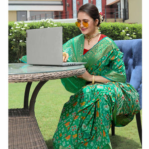 green-patola-printed-with-woven-border-banarasi-silk-saree