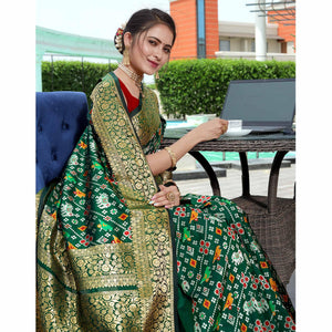 green-patola-printed-with-woven-border-banarasi-silk-saree-1