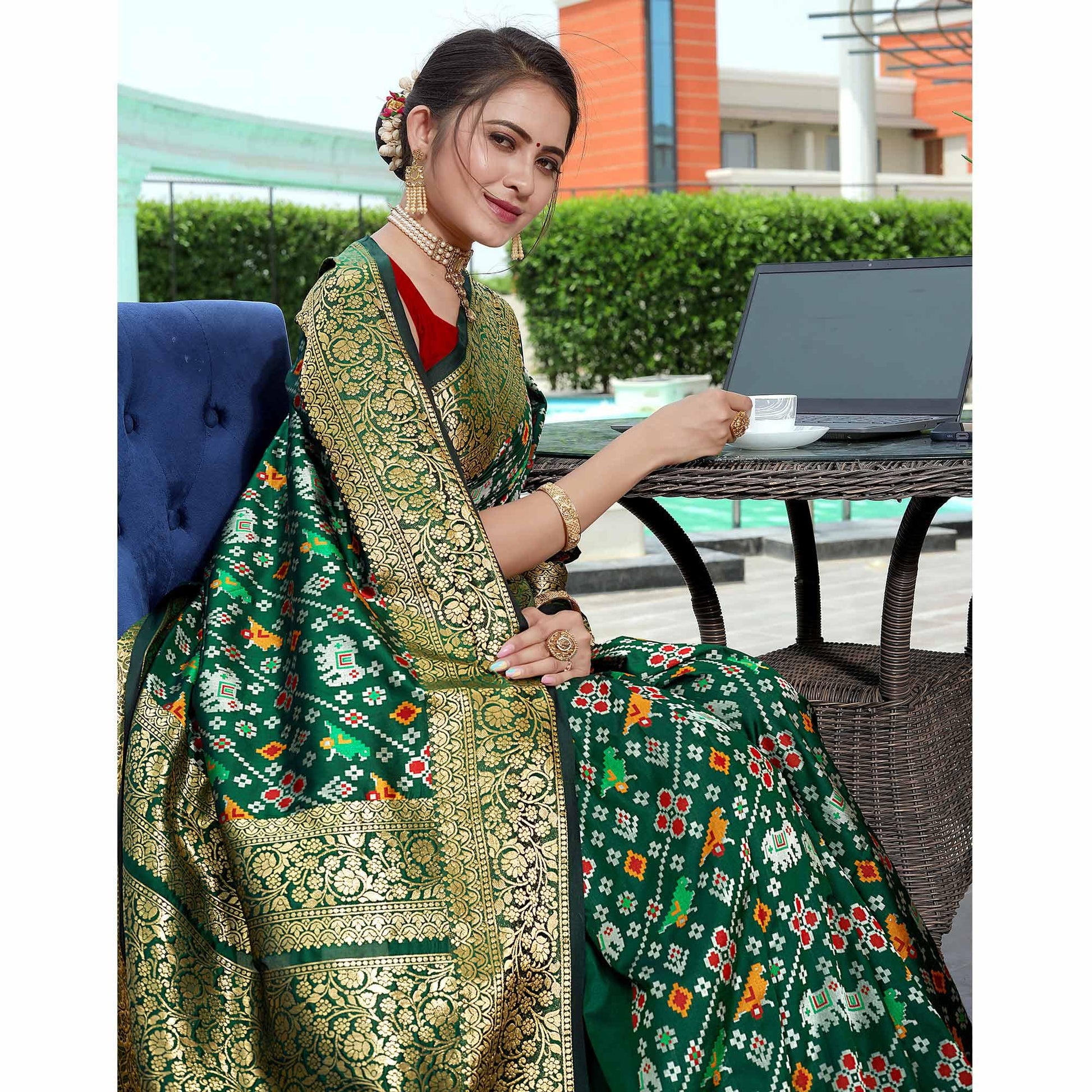 green-patola-printed-with-woven-border-banarasi-silk-saree-1