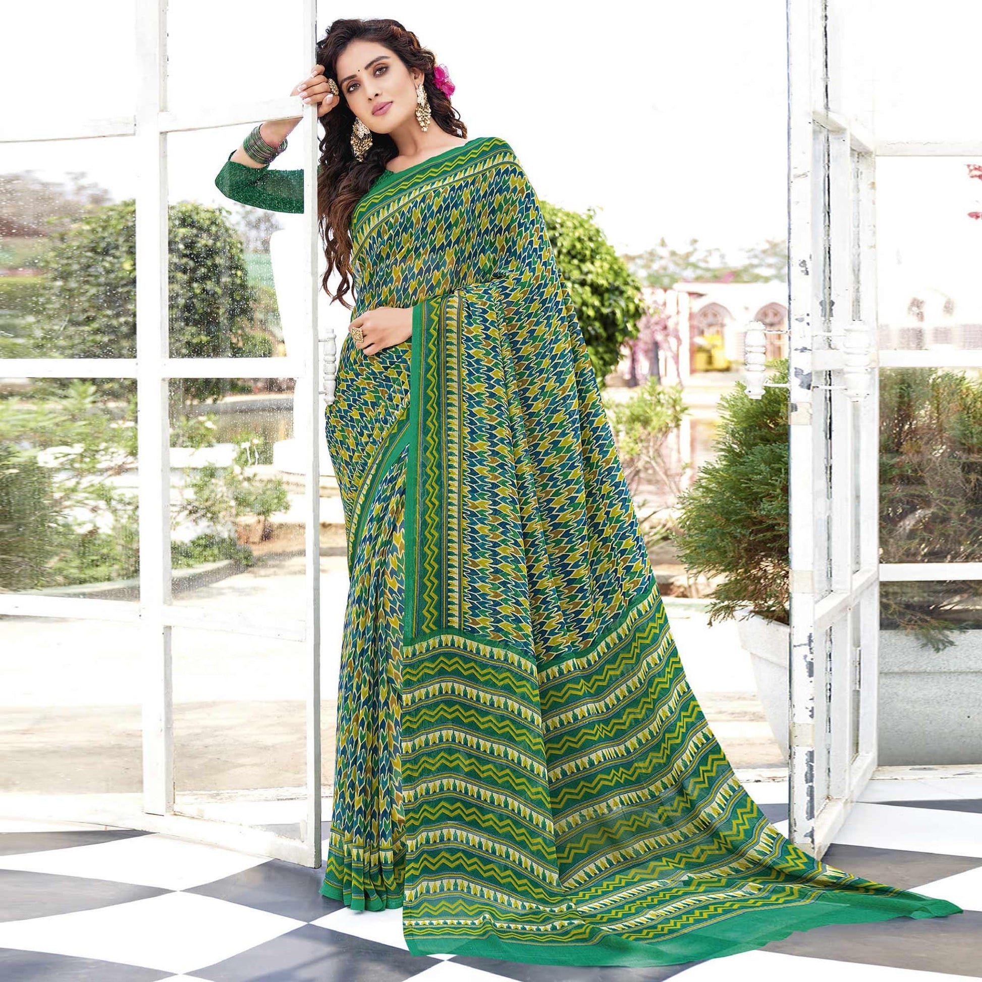 green-printed-georgette-saree-145452