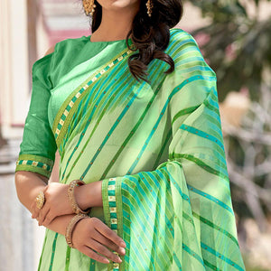 green-printed-with-embellished-georgette-saree-143510