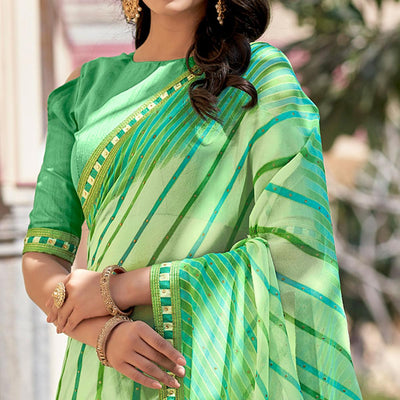 green-printed-with-embellished-georgette-saree-143510