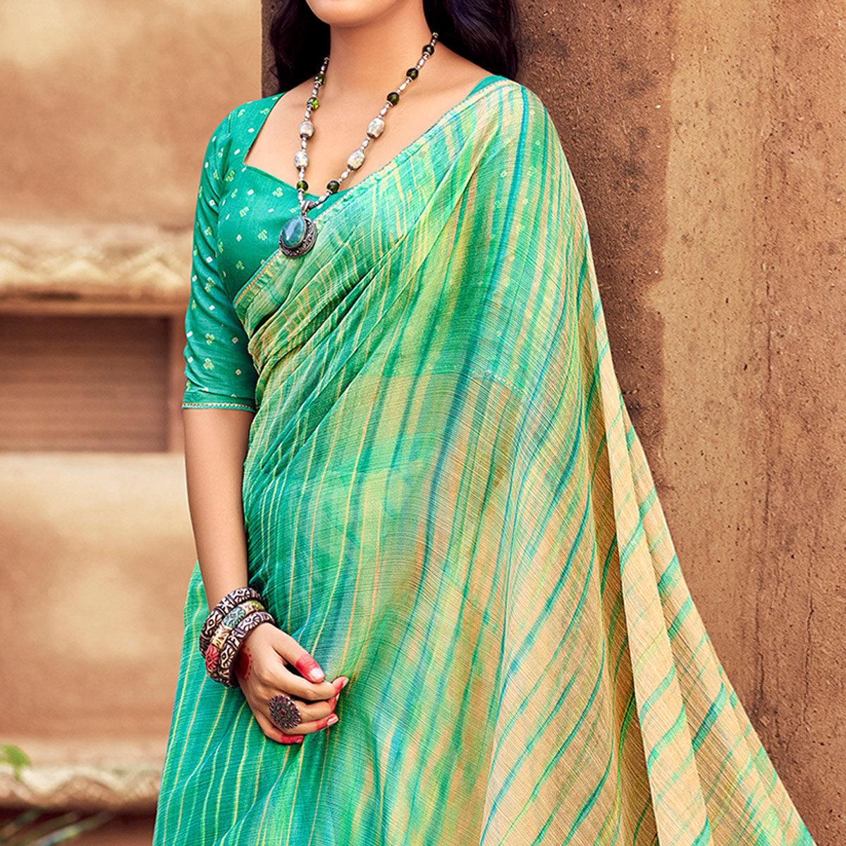 green-printed-with-gota-patti-border-chiffon-saree