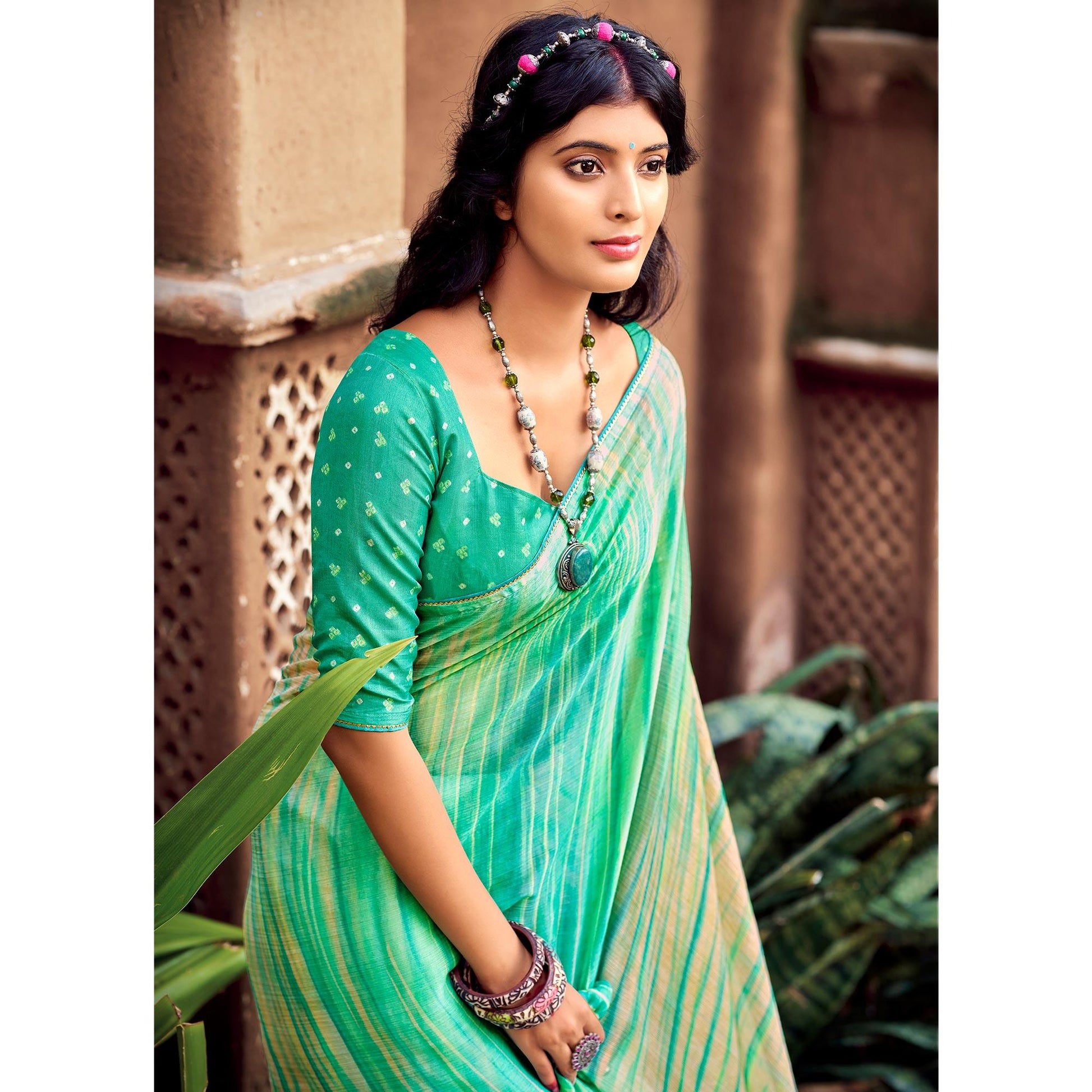 green-printed-with-gota-patti-border-chiffon-saree