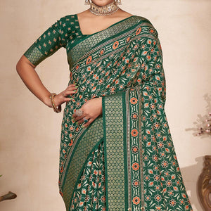 green-printed-woven-dola-silk-saree-with-tassels