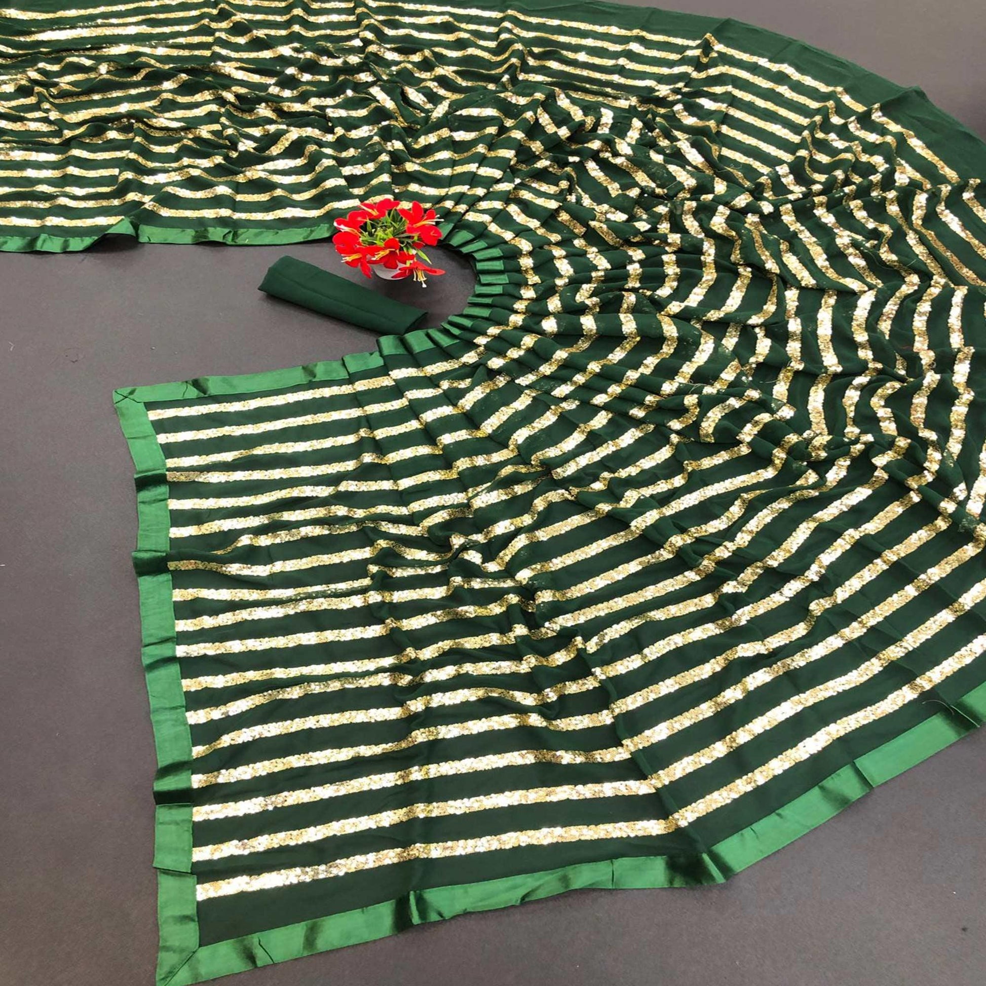 green-sequence-embroidered-with-stripes-georgette-saree-145412