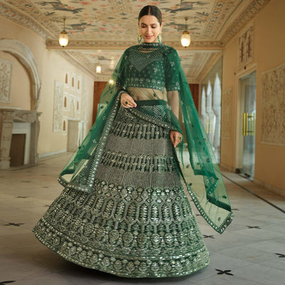 green-wedding-wear-embellished-netted-lehenga-choli-139094