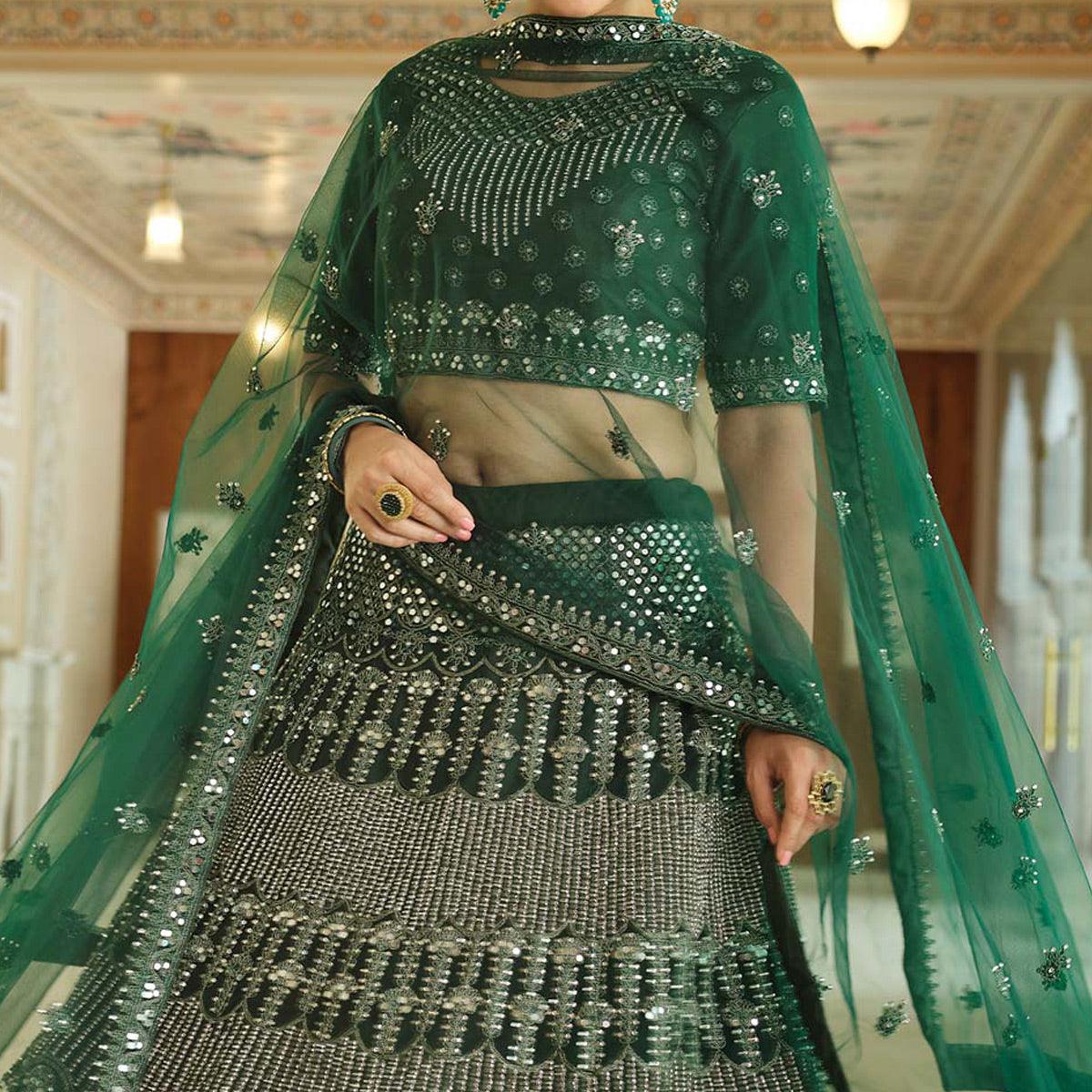 green-wedding-wear-embellished-netted-lehenga-choli-139094