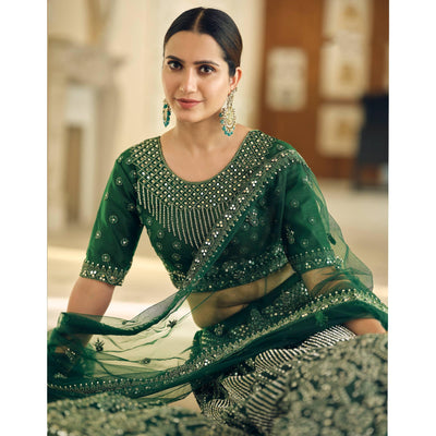 green-wedding-wear-embellished-netted-lehenga-choli-139094