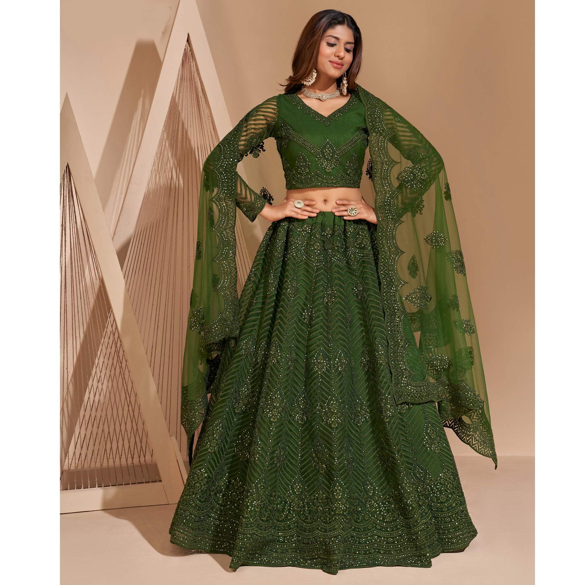 green-wedding-wear-embroidered-with-embellished-net-lehenga-choli-140657