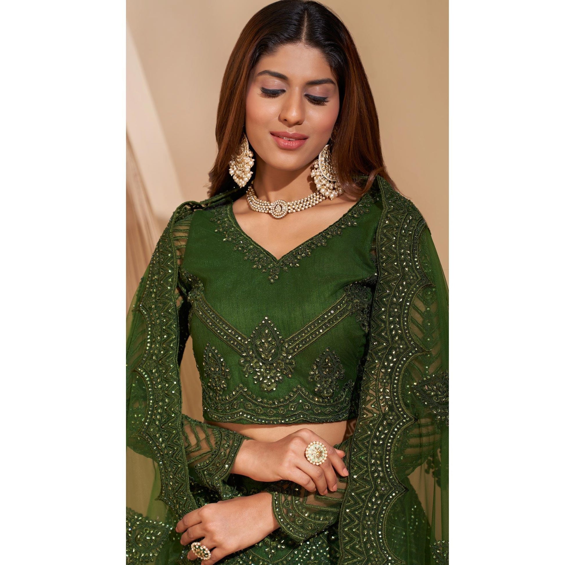 green-wedding-wear-embroidered-with-embellished-net-lehenga-choli-140657