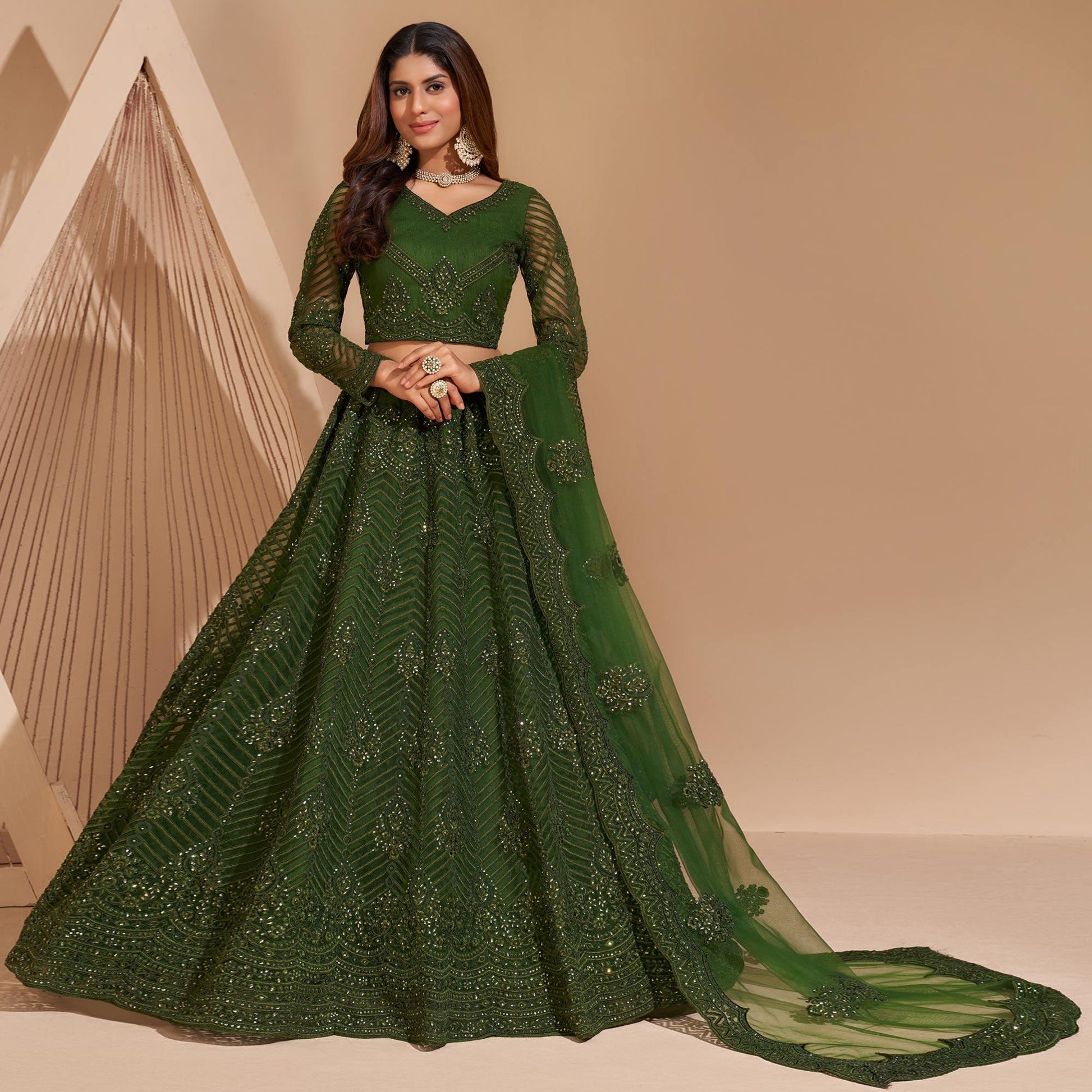 green-wedding-wear-embroidered-with-embellished-net-lehenga-choli-140657