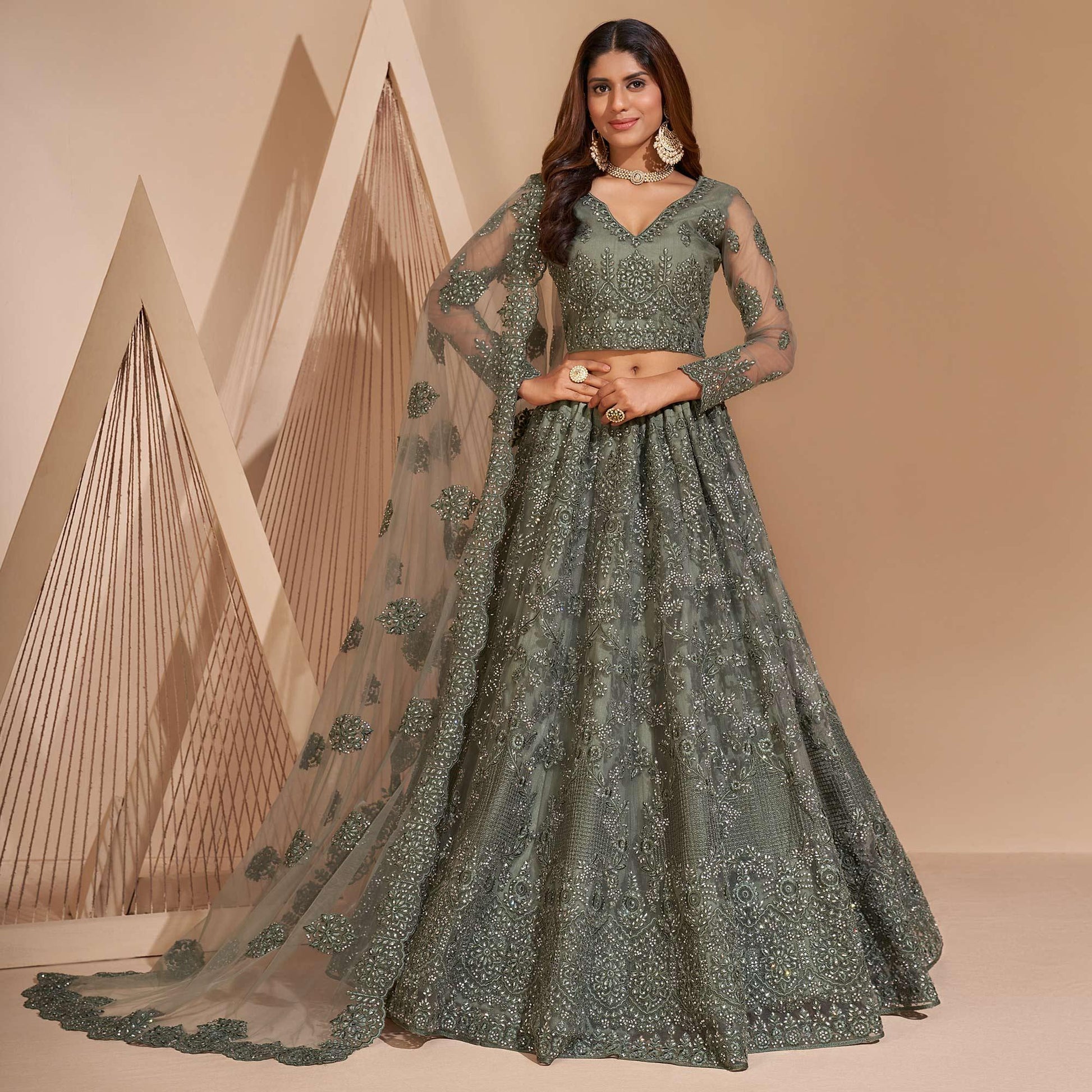 green-wedding-wear-embroidered-with-embellished-net-lehenga-choli-140659
