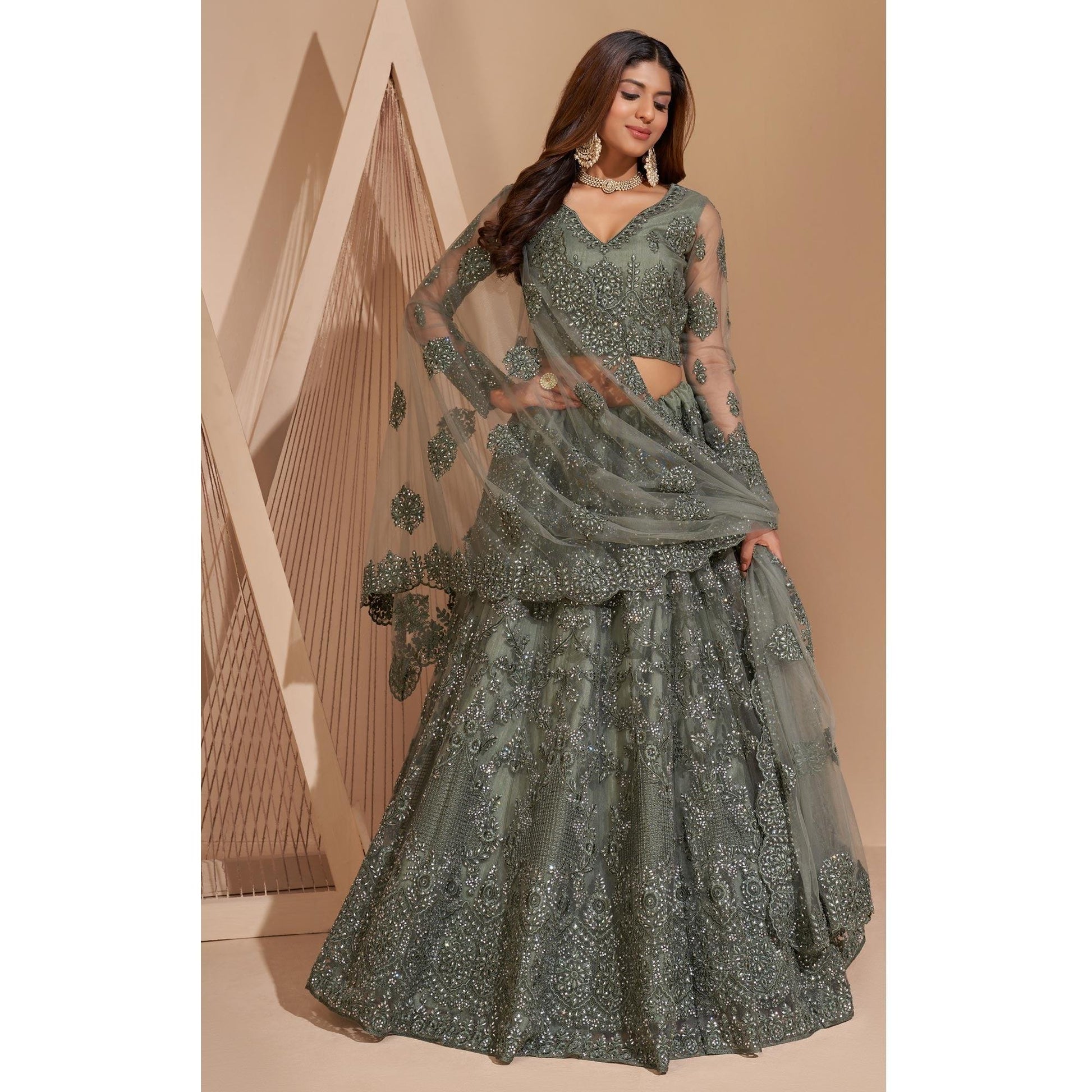 green-wedding-wear-embroidered-with-embellished-net-lehenga-choli-140659