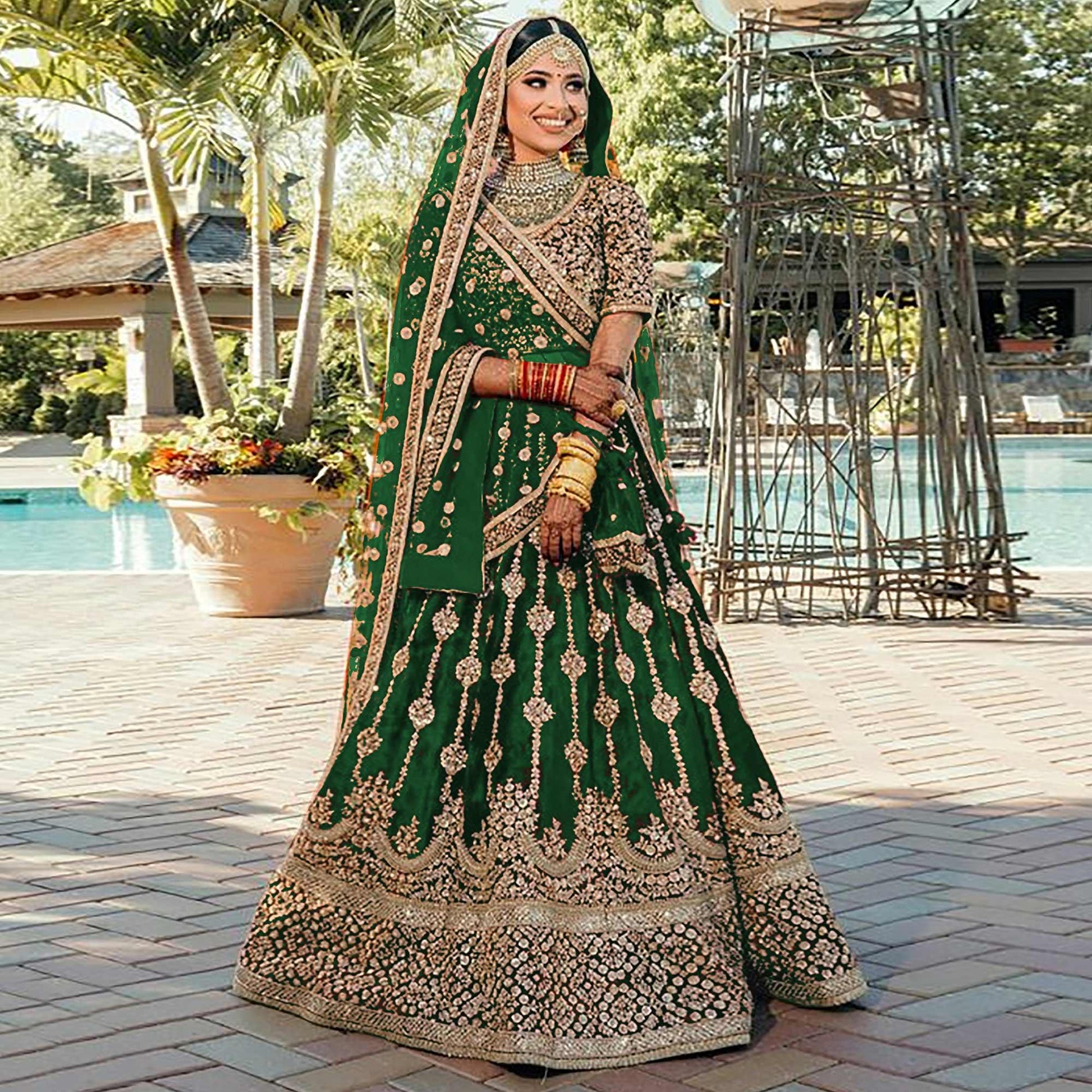 green-wedding-wear-embroidered-with-embellished-velvet-lehenga-choli-139923