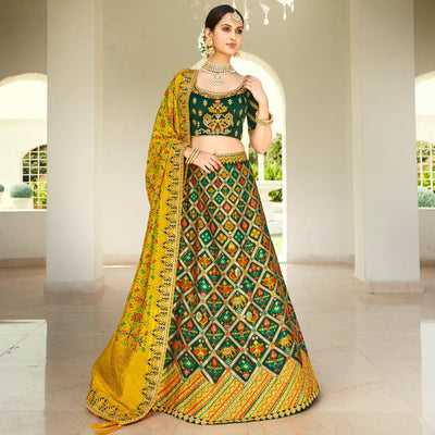 green-wedding-wear-heavy-embroidered-banarasi-silk-lehenga-choli-110488