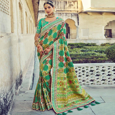 green-wedding-wear-resham-with-embellished-silk-bhandhani-patola-saree-139236