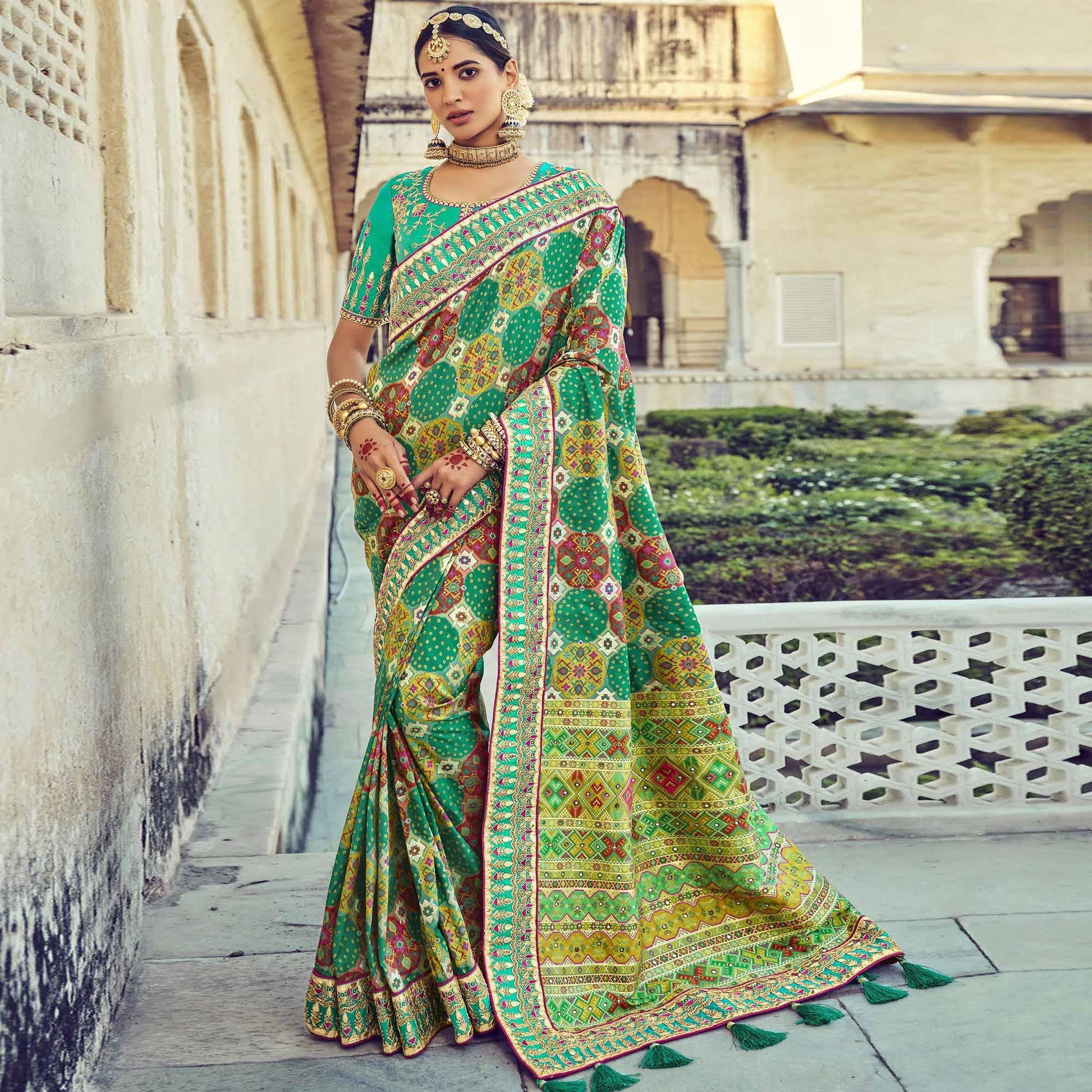 green-wedding-wear-resham-with-embellished-silk-bhandhani-patola-saree-139236