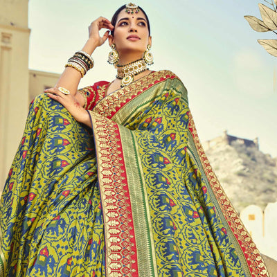 green-wedding-wear-resham-with-embellished-silk-patola-saree-139234