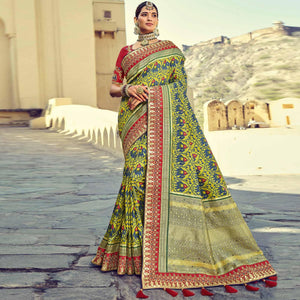 green-wedding-wear-resham-with-embellished-silk-patola-saree-139234