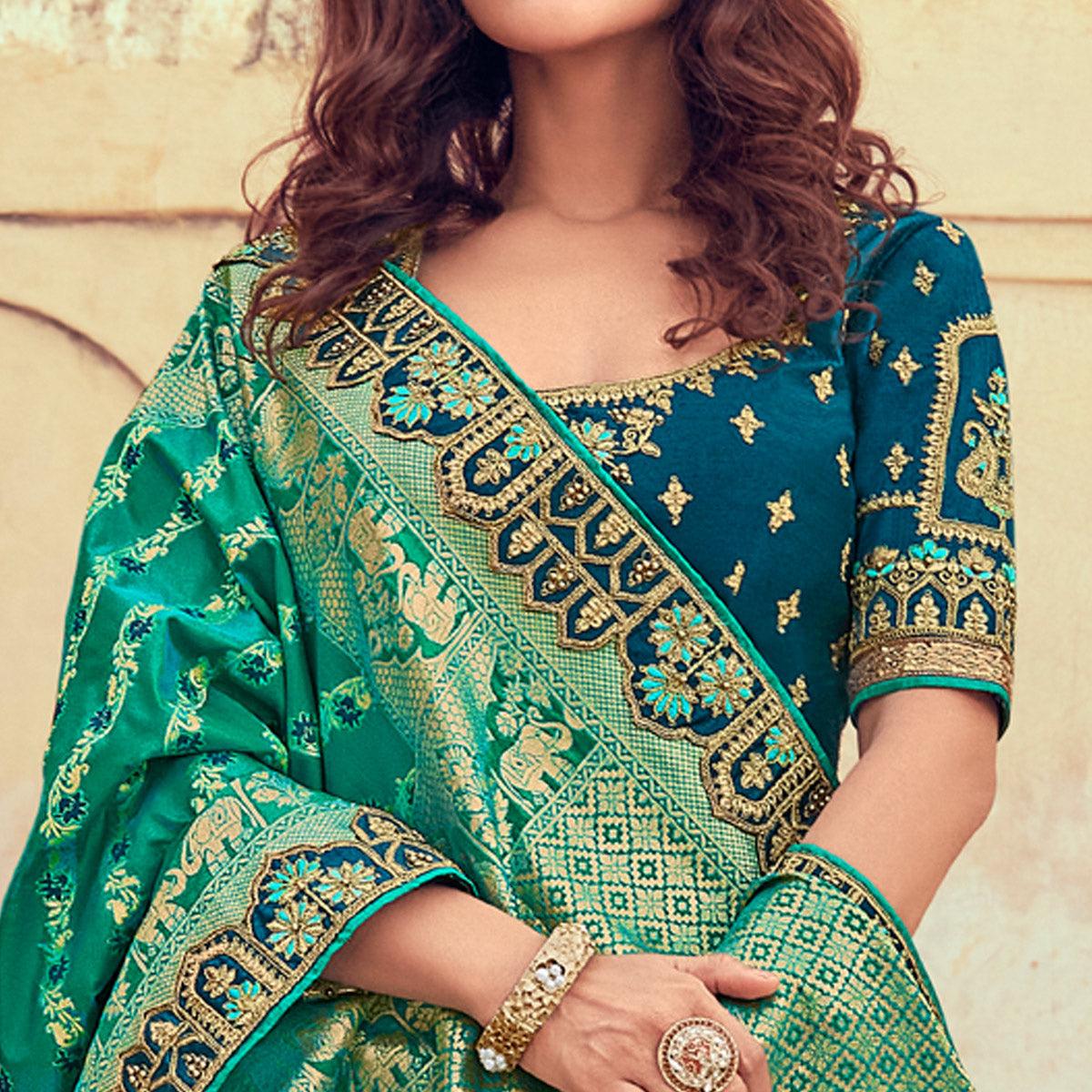 green-wedding-wear-woven-embroidered-silk-lehenga-choli-126743
