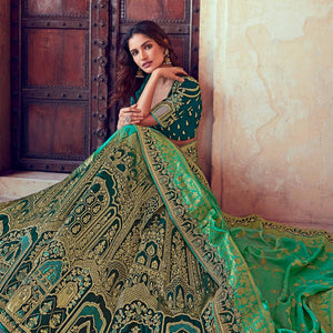 green-wedding-wear-woven-embroidered-silk-lehenga-choli-126744
