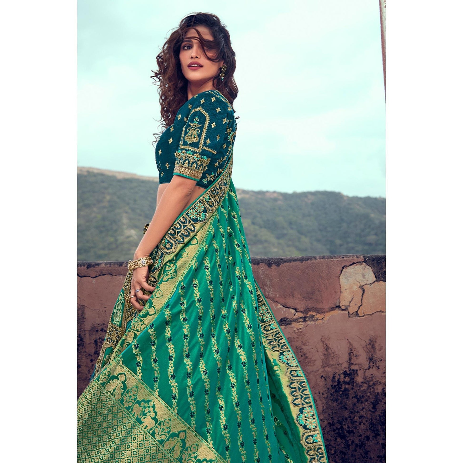 green-wedding-wear-woven-embroidered-silk-lehenga-choli-126743