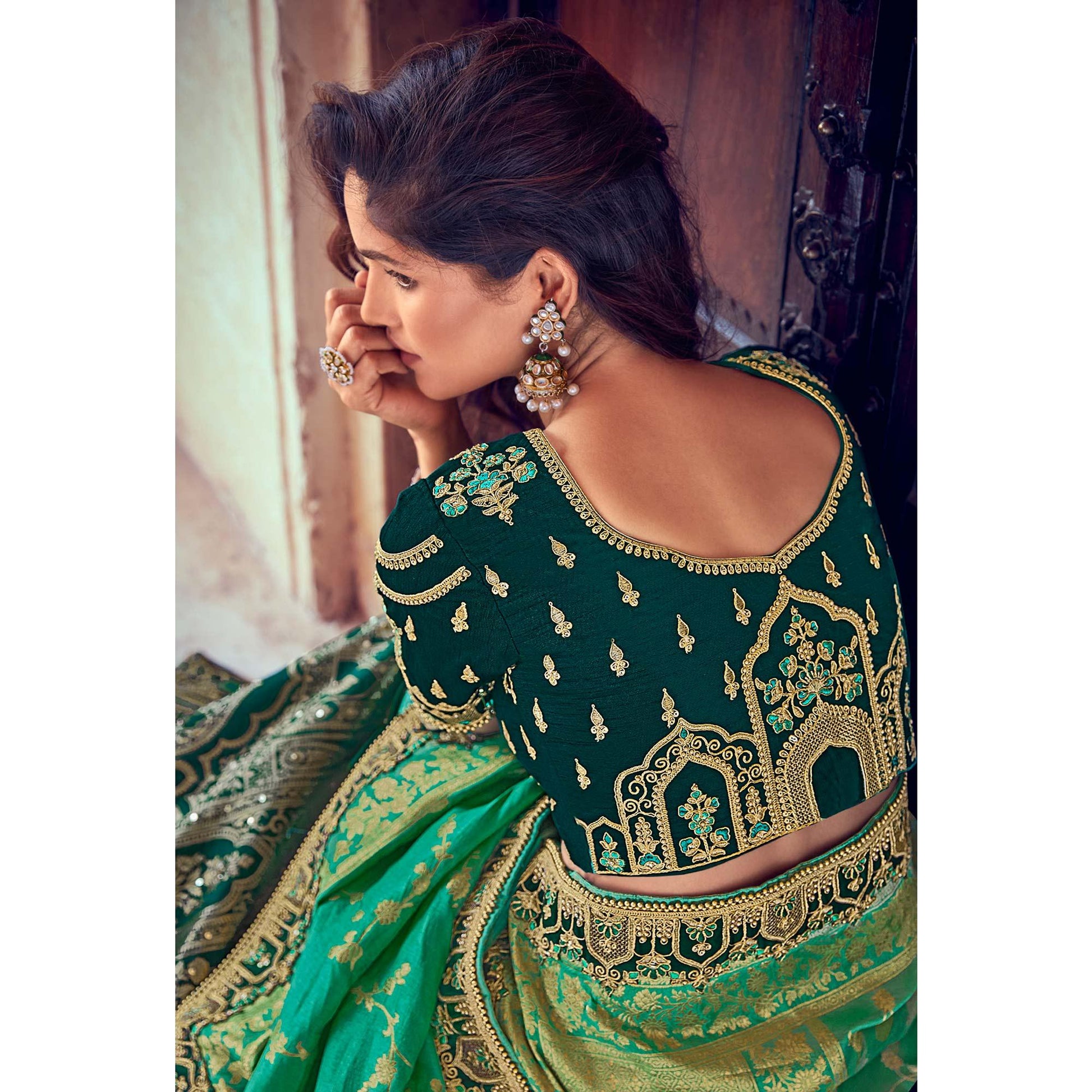 green-wedding-wear-woven-embroidered-silk-lehenga-choli-126744
