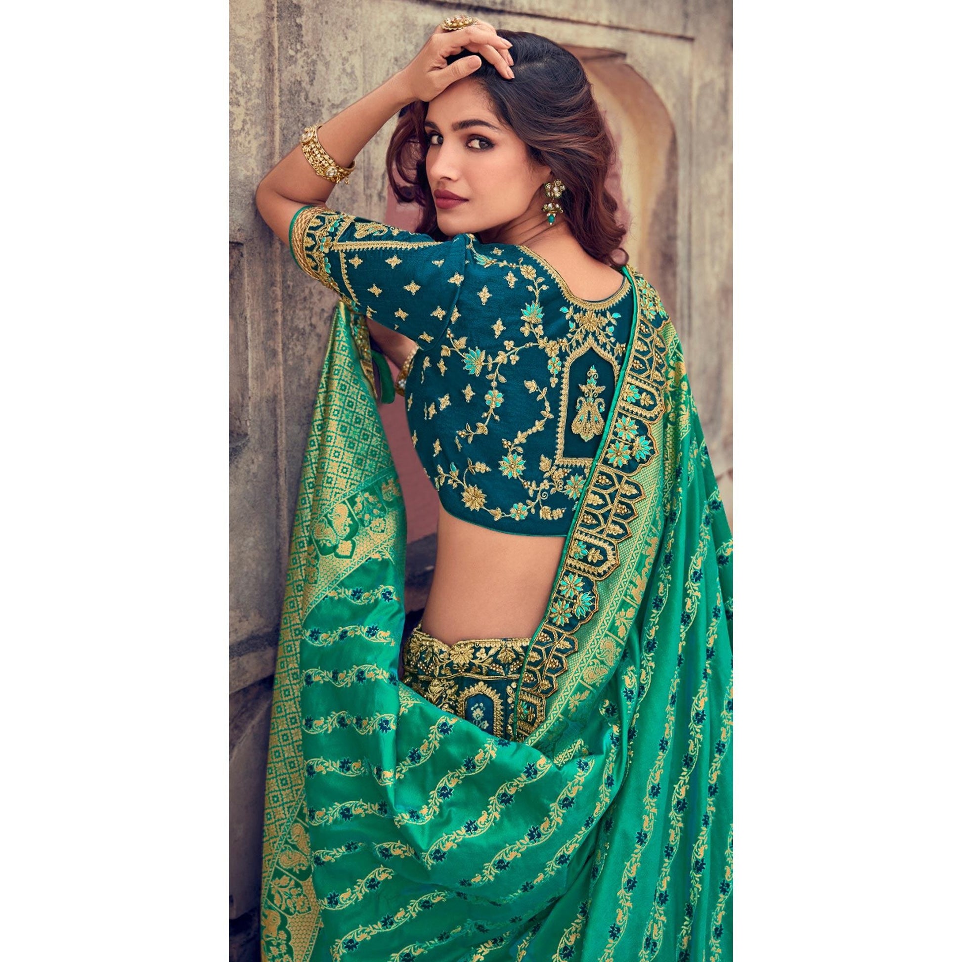 green-wedding-wear-woven-embroidered-silk-lehenga-choli-126743