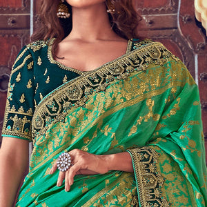 green-wedding-wear-woven-embroidered-silk-lehenga-choli-126744