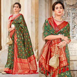 green-woven-art-silk-patola-saree-with-tassels