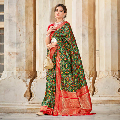 green-woven-art-silk-patola-saree-with-tassels
