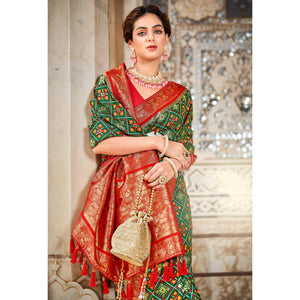 green-woven-art-silk-patola-saree-with-tassels