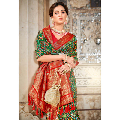 green-woven-art-silk-patola-saree-with-tassels
