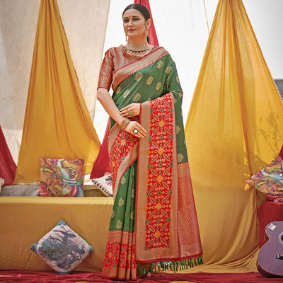 green-woven-banarasi-silk-saree-with-tassels